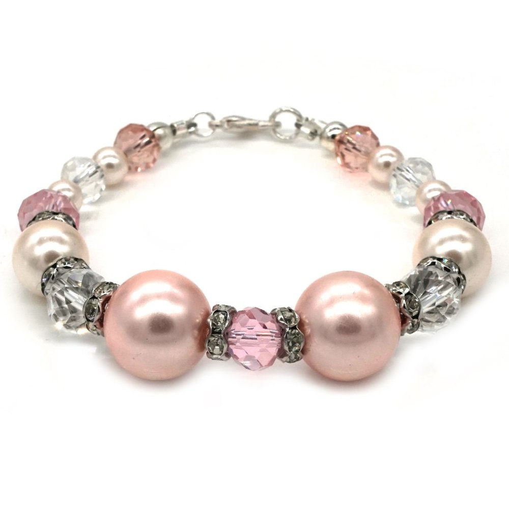 Bracelet with pink pearl beads and crystals.